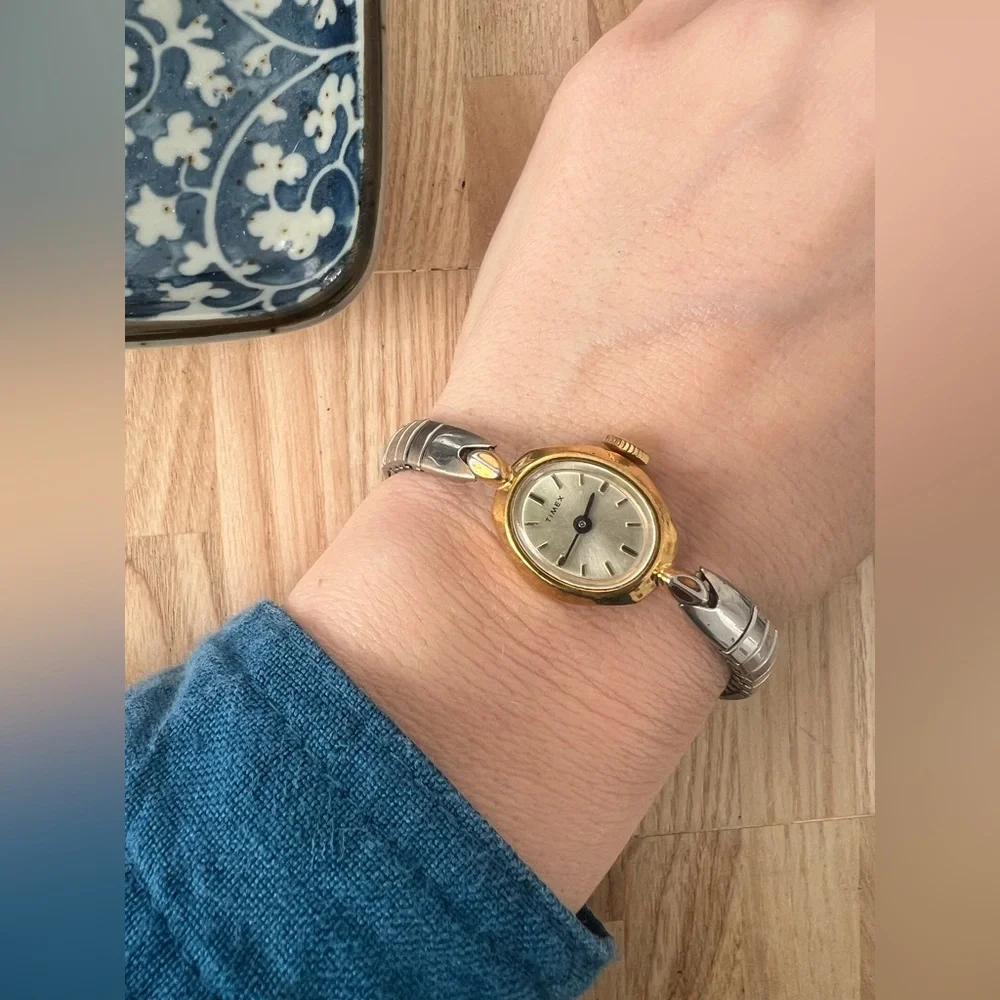 Vintage Timex ladies oval two toned mechanical winding dress watch